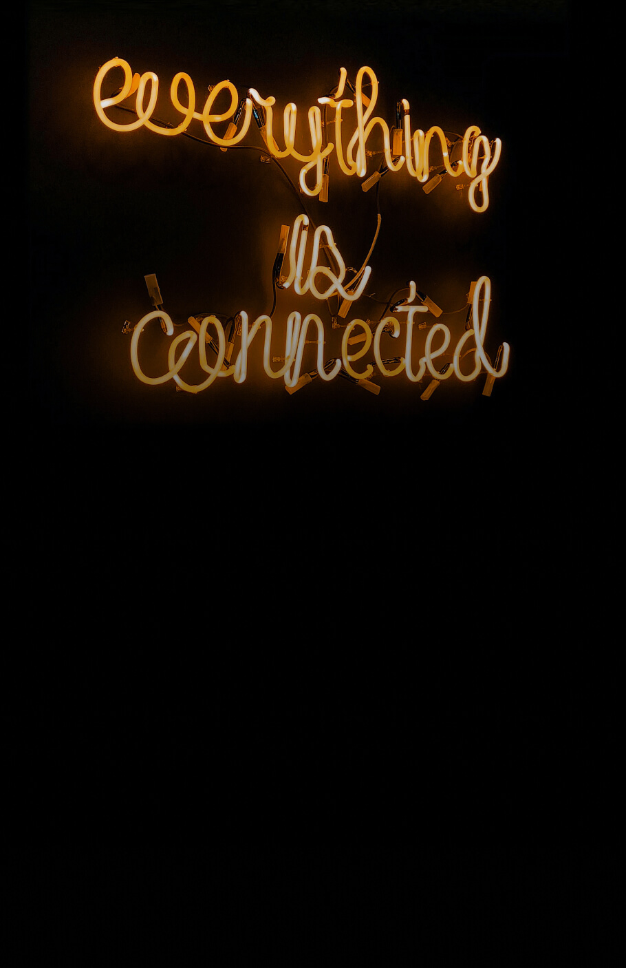  "Everything is connected" in yellow neon letters meaning that corporates will be connected to start-ups